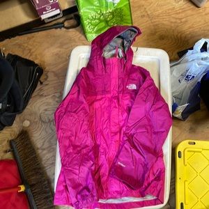 Woman’s North Face rain jacket
